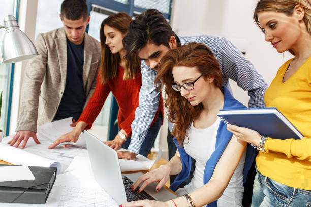 istock Group of business people working on new project . 667056082