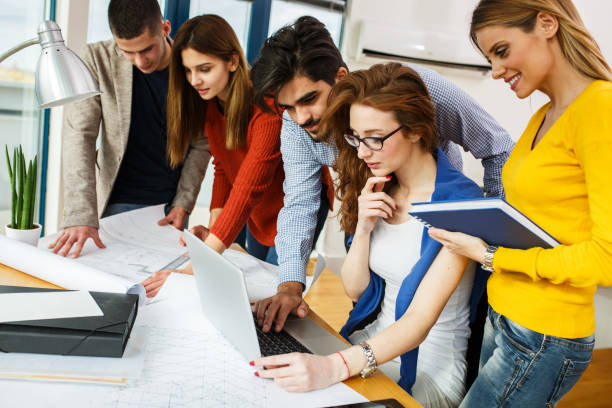 istock Group of business people working on new project . 667056710