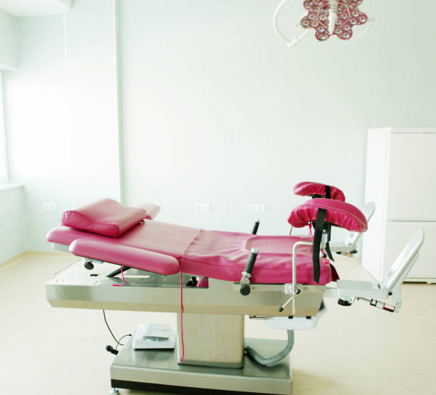 Gynecological chair in gynecological room Gynecological chair in gynecological room. home birth photos stock pictures, royalty-free photos & images