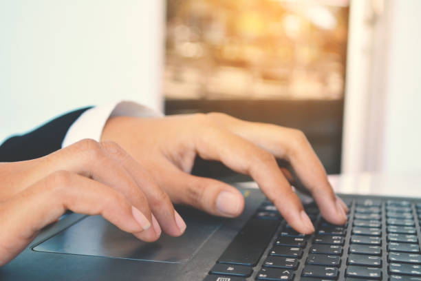 istock Close up of hand  businesswomen using computer 667067516