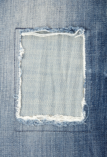 Patched jeans close-up