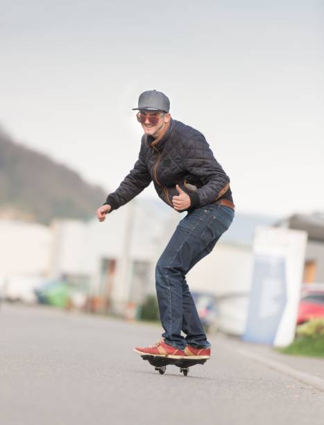istock Young sporty man has fun with the waveboard 667075154