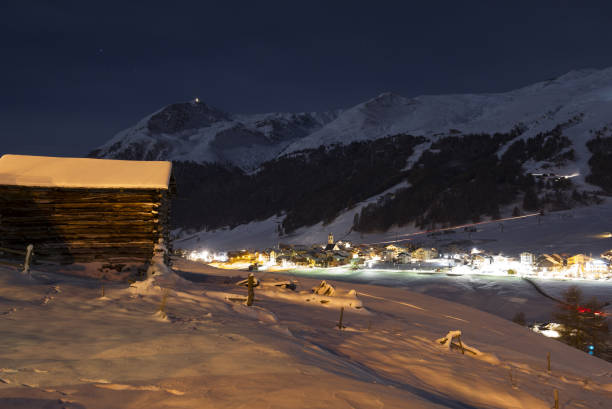 istock Livigno night winter view - Livigno winter night view 667075284