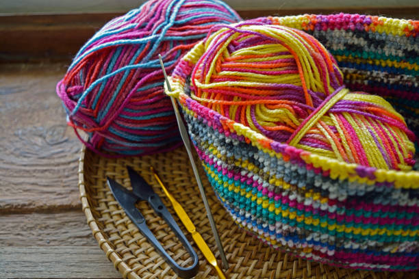 istock Equipment for crochet work in a basket 667079548