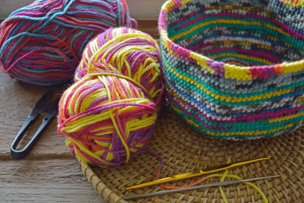 istock Equipment for crochet work in a basket 667080462