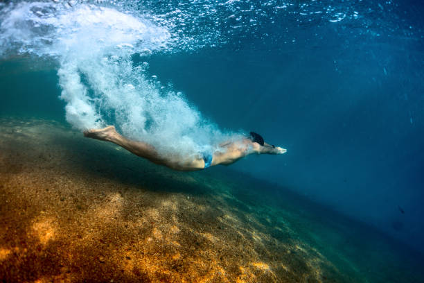 istock Man in the sea 667082848