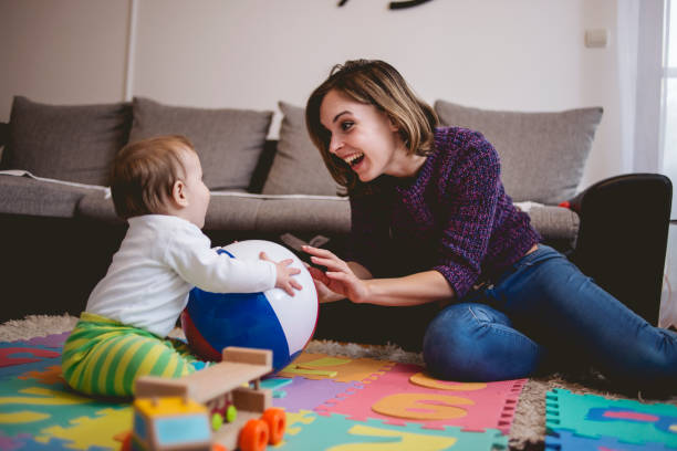istock Mother playing with her happy son 667086668
