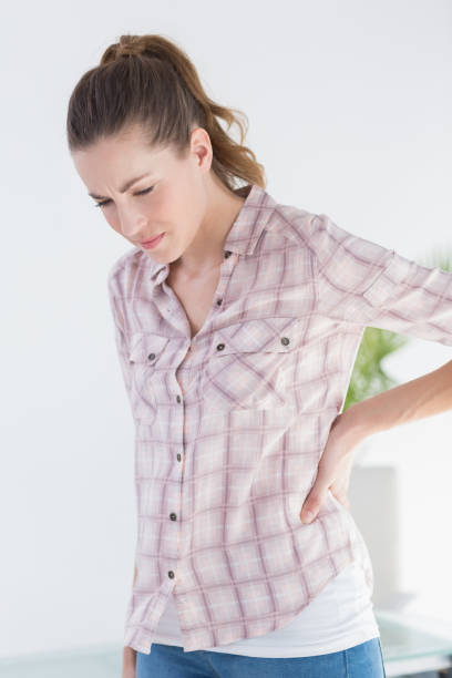 istock Patient with stomach ache  looking at camera 667087264
