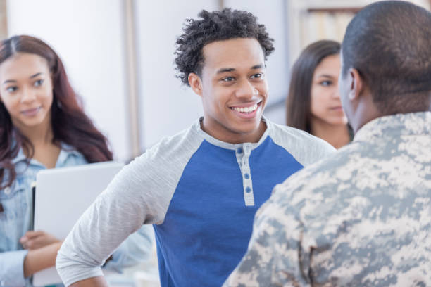 istock Confident young man talks with recruitment officer 667091382