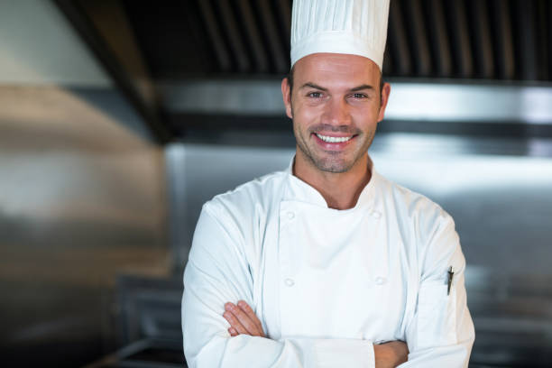 istock Happy chef in commercial kitchen 667093652