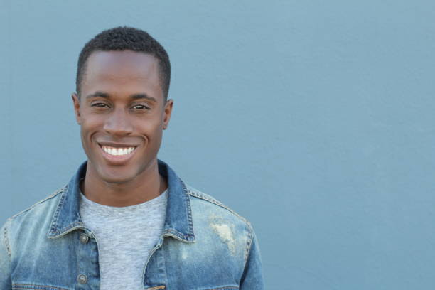 istock Man with a perfect white smile 667094712