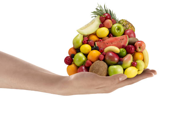 istock handfull of fruits 667095242