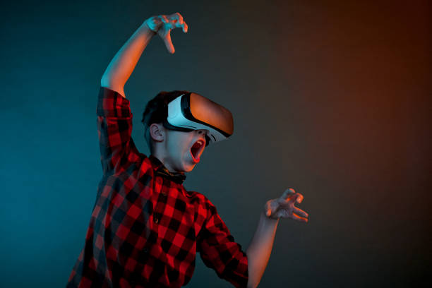 istock Little boy in VR headset frightening 667097958