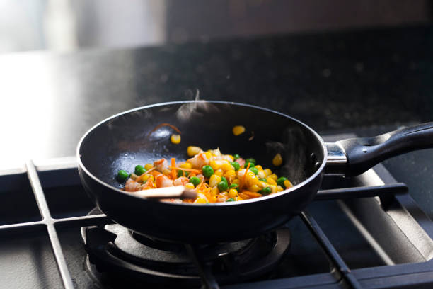 istock Cooking - close up of pan with vegetables 667098778