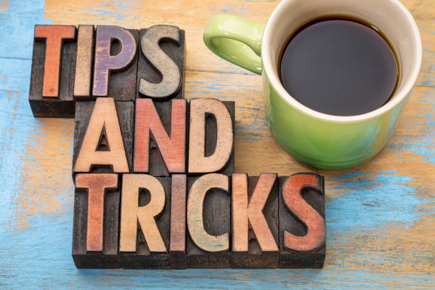 istock tips and tricks word abstract  in wood type 667099086