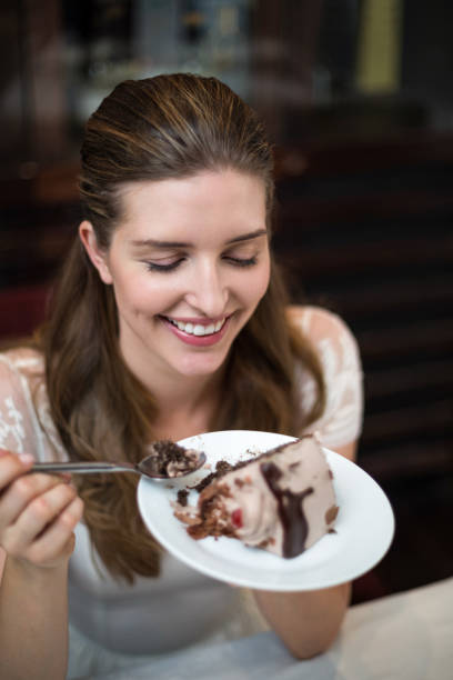 istock Happy woman enjoying desert 667099544