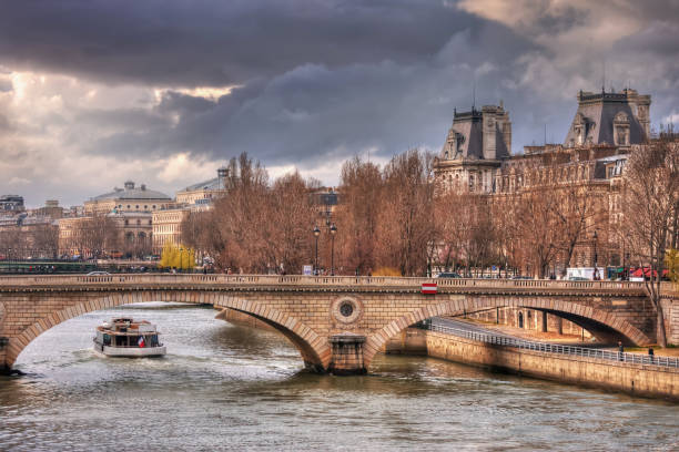 istock Gray clouds over Pont Louis-Philippe 667103978