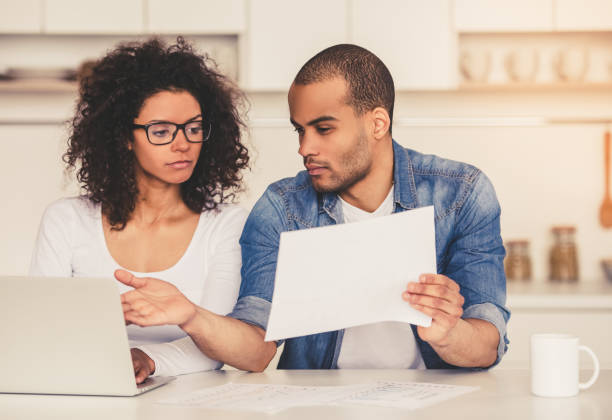 istock Afro American couple in kitchen 667104242