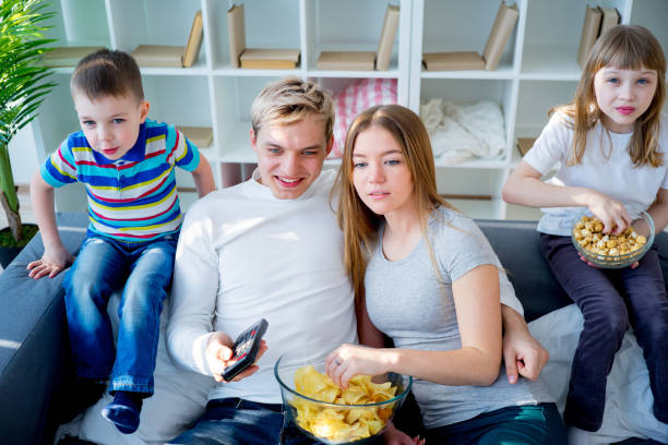 istock Family watching a film 667107602