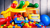 Colorful plastic toys in children's room