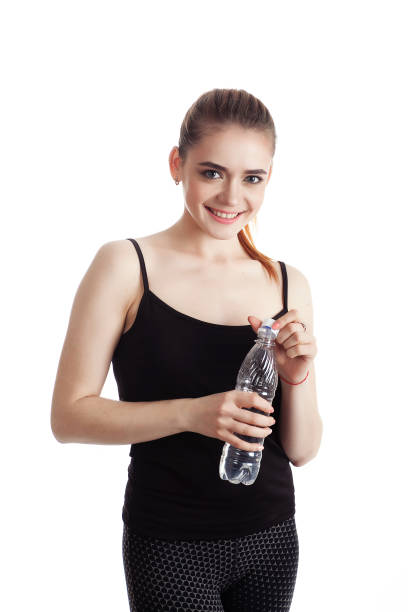 istock Woman with a bottle of water 667110764