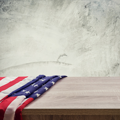USA flag on wood cement wall background and texture with space