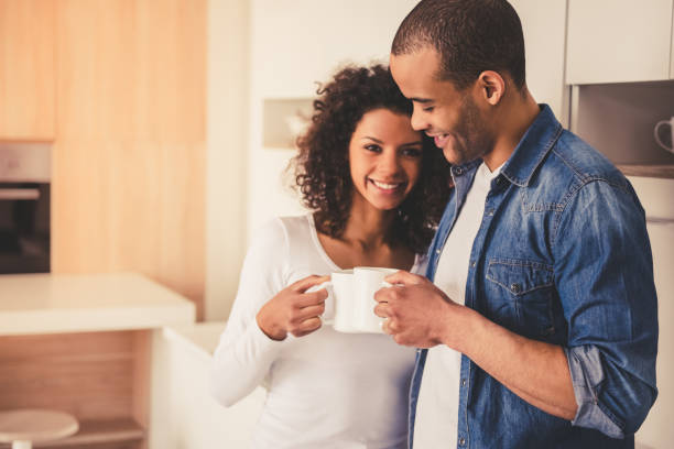 istock Afro American couple in kitchen 667113860