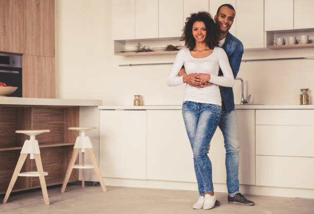 istock Afro American couple in kitchen 667114218