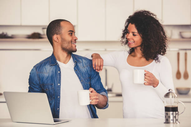 istock Afro American couple in kitchen 667114364