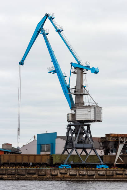istock Cargo crane in the port 667114570