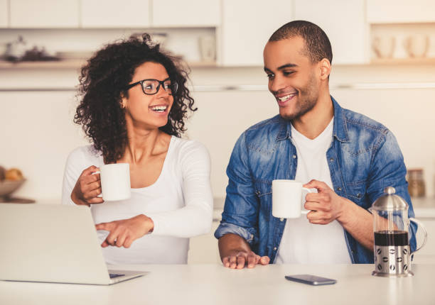 istock Afro American couple in kitchen 667114582