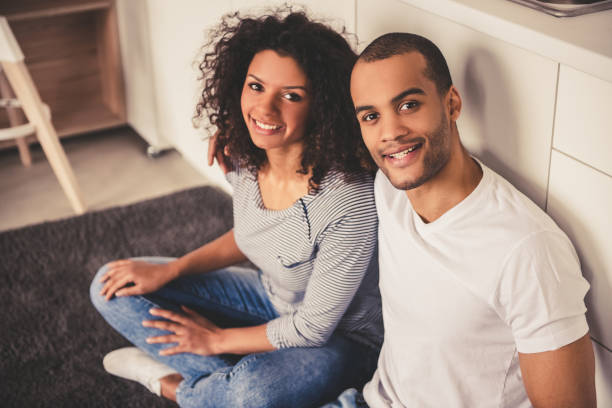 istock Afro American couple in kitchen 667115656