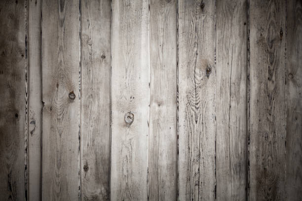 istock Uncolored old grungy wooden wall flat texture 667118480