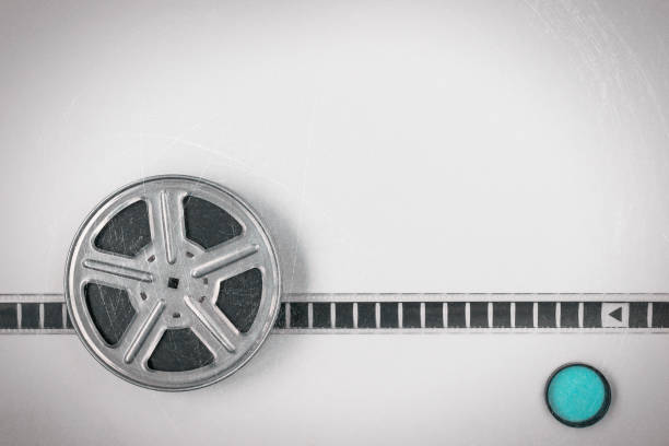 The metal coil with the film and the blue filter are on a gray background.