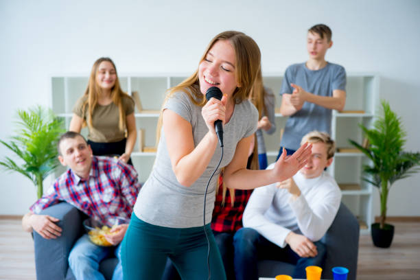 istock Friends singing a song together 667119338