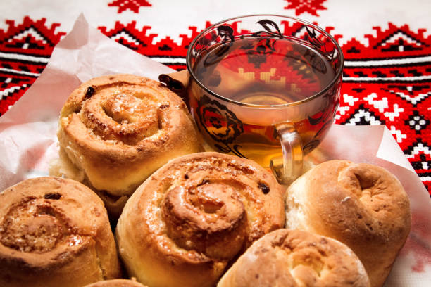 istock Fresh-baked cinnamon rolls and a cup of tea. 667122300