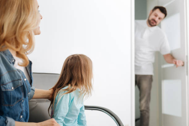 istock Joyful qualified dentist inviting his little patient 667123522