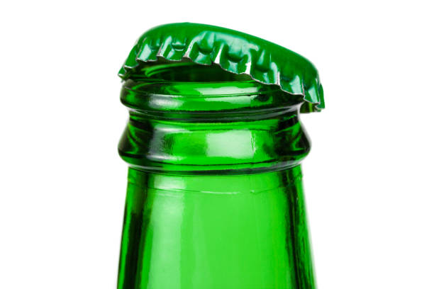 istock Bottleneck of green beer bottle over white background 667127238