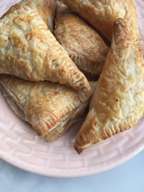 istock freshly baked puff pastry on plate 667128698