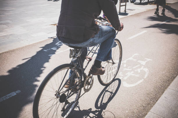 istock Cyclist riding a bike lane 667134666