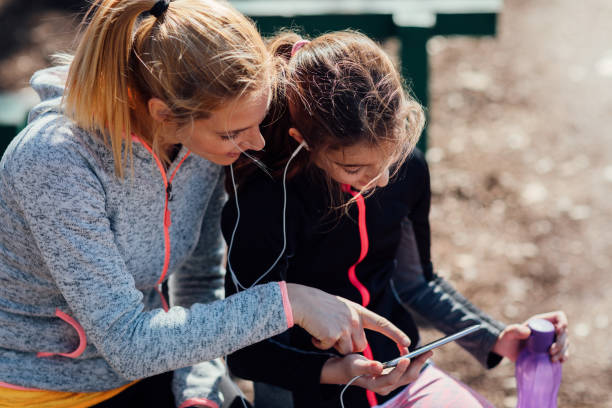 istock Mother and daughter jogging 667135634