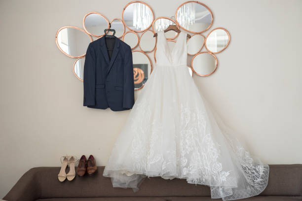 istock wedding dress and suit 667140254