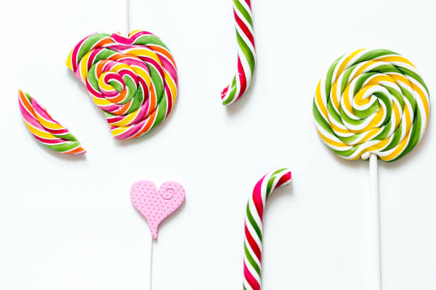 istock sweets and sugar candies on white background top view 667144346