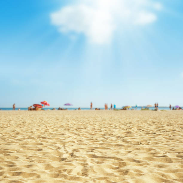 istock sand on the beach under clouds in blue sky 667156066