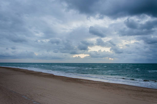 istock Dramatic sky over the beach in Cadiz, Spain 667156068