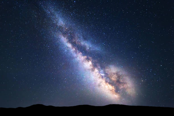 istock Colorful night landscape with bright milky way 667159790