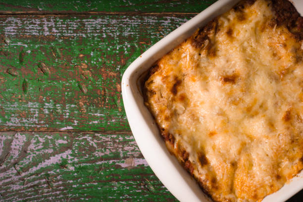 istock Homemade Meat lasagna on wooden green table 667176868