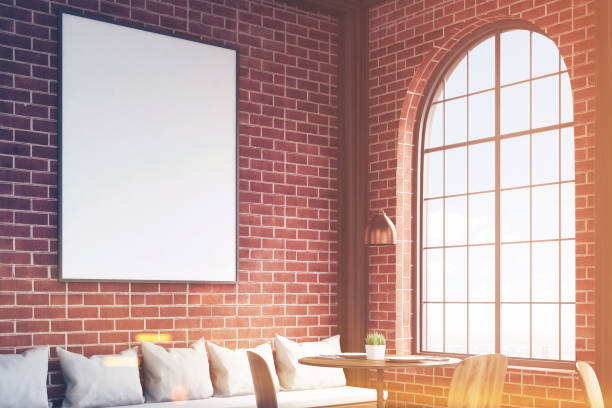 istock Poster on a brick cafe wall, close up, toned 667179896
