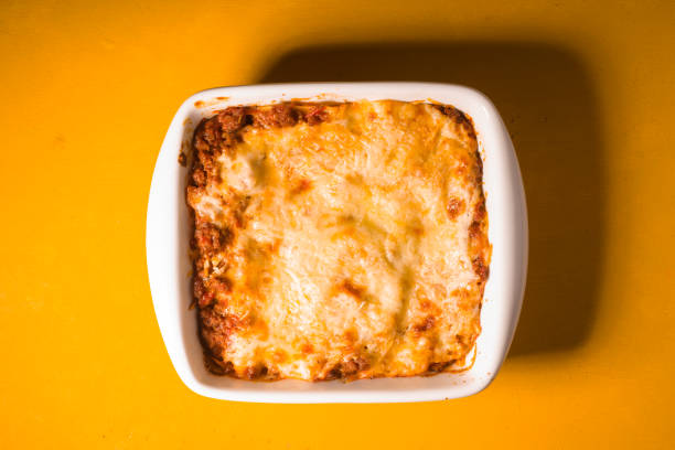 istock Homemade Meat lasagna on wooden yellow table 667180576