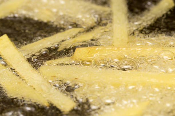 istock French fries fried in a pan 667181238